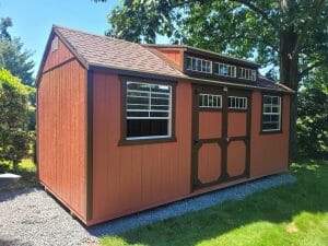 Red shed on gravel foundation