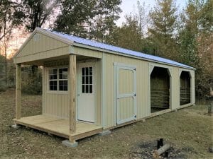 Double animal shelter with storage room