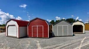 Multi-colored metal sheds on parking lot
